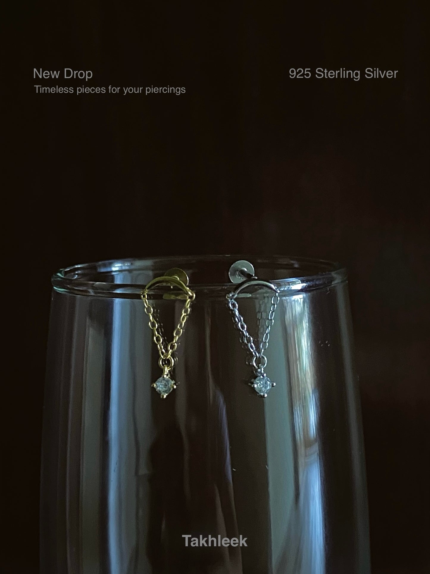 Chained zircon dangling stud